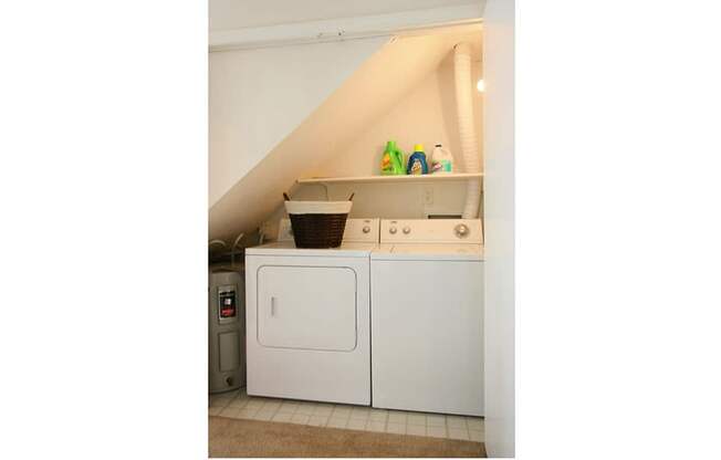 a laundry room with a washer and a dryer