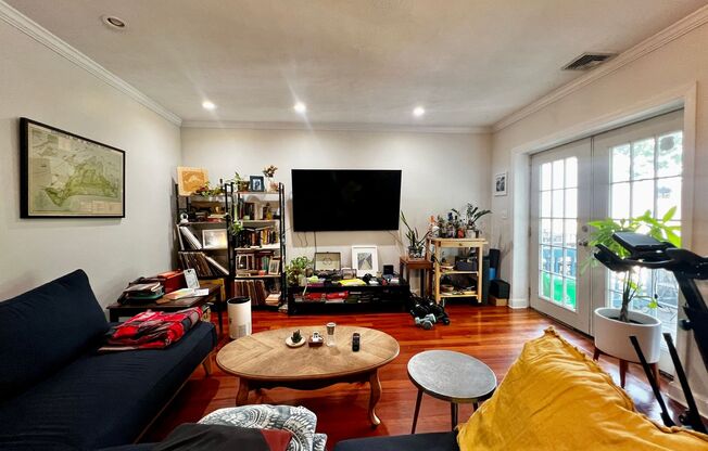 Stylish Top-Floor 2-Bedroom Condo with Private Deck & Skylights in Prime Dorchester Location