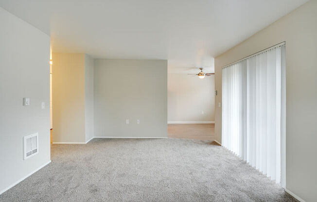 Living room near patio and kitchen