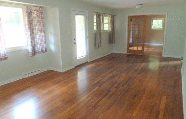 Large Duplex home with giant deck, parking, in quiet neighborhood, Available in June