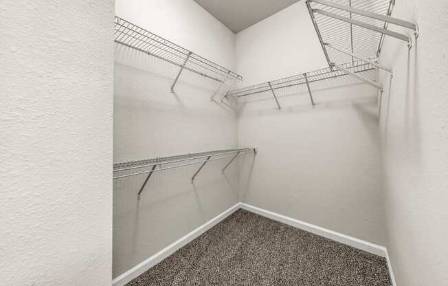 our spacious closets are equipped with shelves and hooks for hanging clothes