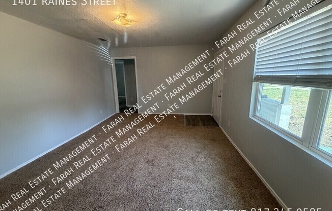 1401 RAINES ST