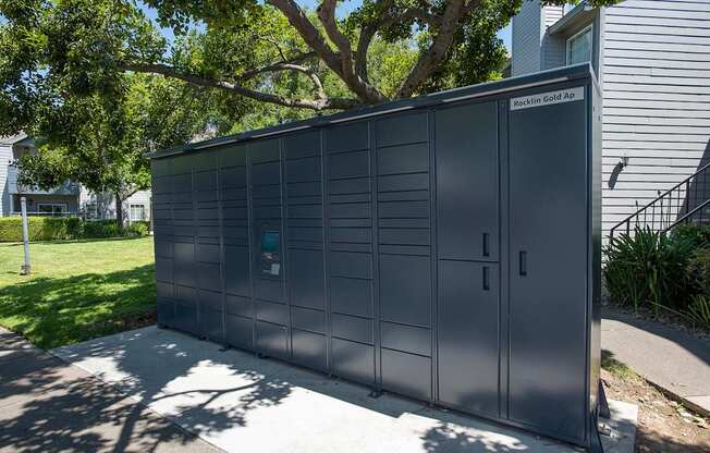 Gray package lockers at Rocklin Gold Apartments, California, 95677