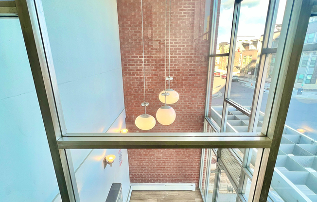 Experience urban elegance with this loft's expansive windows and contemporary design elements.