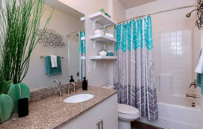 Bathroom with granite counters, at Sycamore at Tyvola, Charlotte, 28217