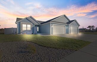 BRAND NEW TWIN HOME WITH XL GARAGE AND FENCED YARD