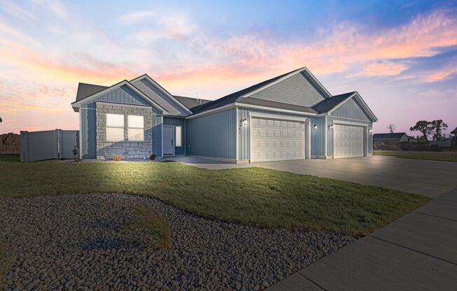 BRAND NEW TWIN HOME WITH XL GARAGE AND FENCED YARD