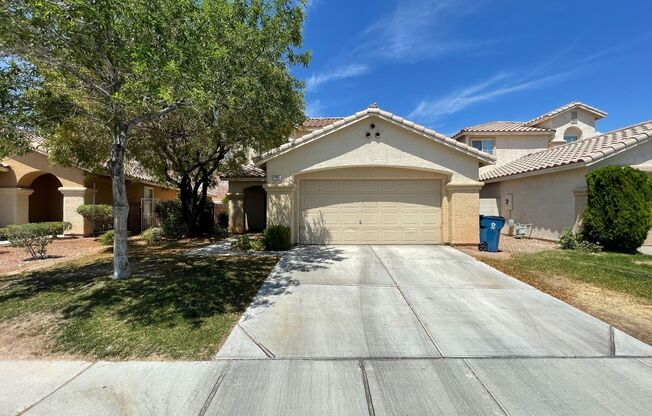 Summerlin home with open floor plan and large kitchen area! Home features spacious master bedroom and a large low maintenance backyard!