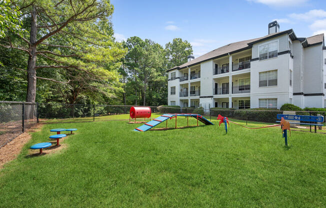our apartments offer a dog park with a playground