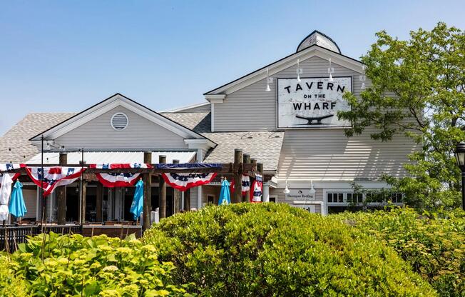 Relax with waterfront dining at Tavern on the Wharf, a local favorite near Modera South Shore.