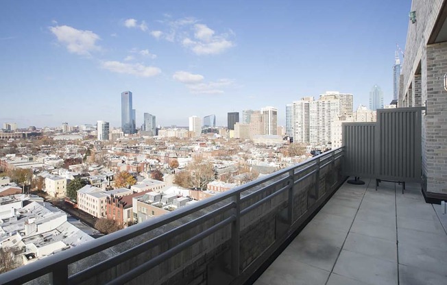Stunning Philadelphia skyline views from the balcony of The Pepper Building, located in the heart of the Rittenhouse and Graduate Hospital neighborhoods.