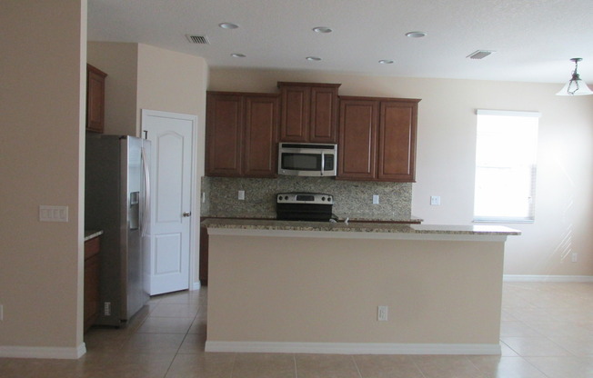3 Bedroom, 2 Bath Single Family Home at 4956 Maple Park, Orlando, FL 32811. Next  Millennia Elementary School,