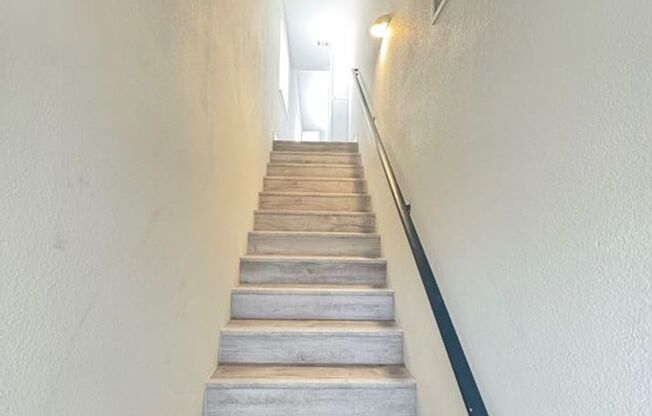 Beautifully maintained 1,219 sq. ft., 2-bedroom, 2-bathroom, 2nd floor condo