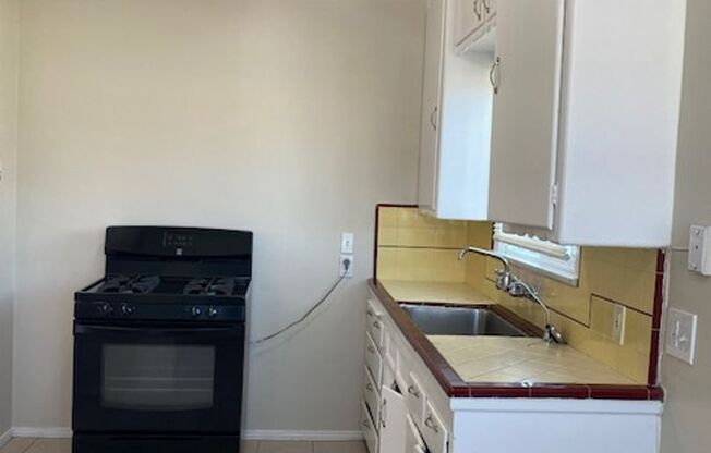 Large 2 Bedroom, 1 Bath with Parking and Laundry Hook Ups