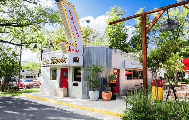 a diner with a sign on the side of a building