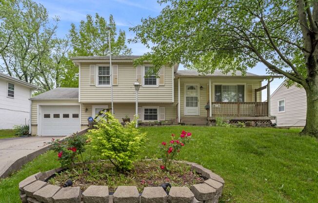 NEW Lower Rate! Beautiful 4 Bedroom Home with extension work garage/work space