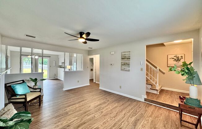 Completely Updated & Ready NOW! New Flooring, Fresh Paint, New Fixtures! HUGE Fenced Backyard!