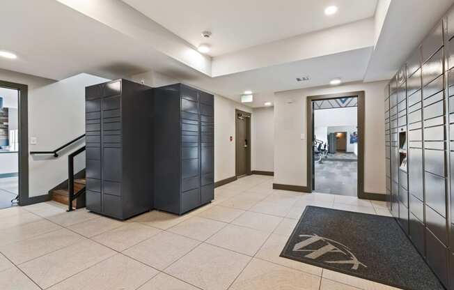 Lobby with elevators and a rug in the center of the room at Windsor Westminster, Westminster, Colorado