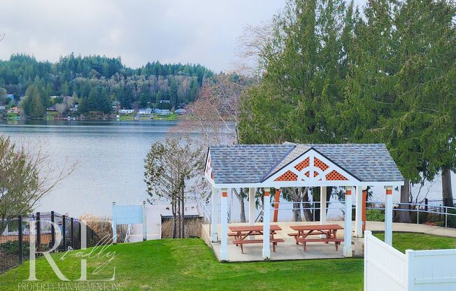 Modern Elegance Meets Tranquil Lakeside Living On Osprey Circle