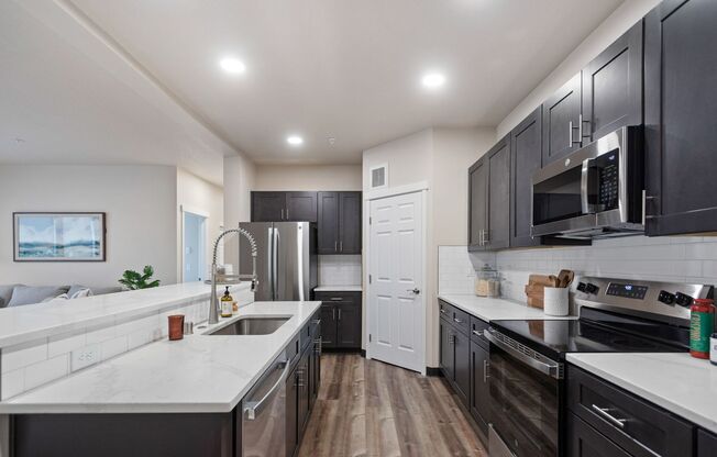 2 beds, 2 baths, 1,199 sqft, $1,750, Unit J-402