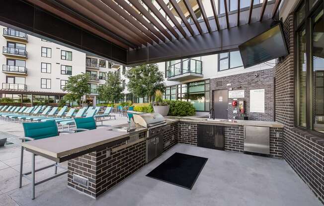 Outdoor Grilling Station and Dining Area at 1000 Speer by Windsor, 80204, CO