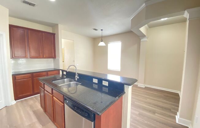 Great location, corner model, 3B/2.5B townhouse in desired neighborhood with community pool!