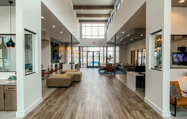 Caprock Crossing Apartments in College Station, TX Clubhouse with seating area and communal kitchen