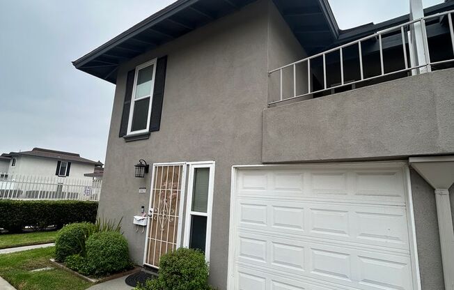 Two story Cypress townhouse, garage, patio, laundry and pool access