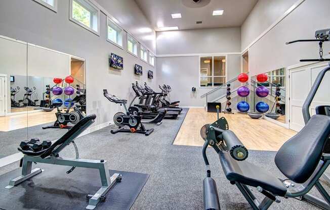 The Reserve at Bucklin Hill gym with treadmill work out balls and weights