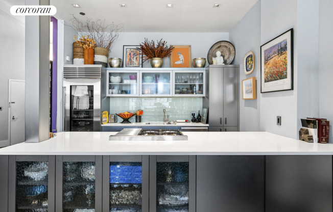 114 E 13 ST