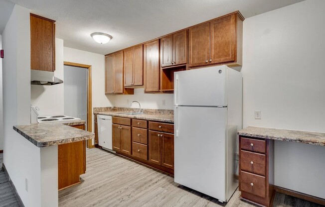 Elevate your lifestyle at Central Lakes of Uptown, where modern amenities meet stylish living. This spacious kitchen features sleek finishes and ample storage for all your culinary creations. Don’t wait—schedule your tour today!
