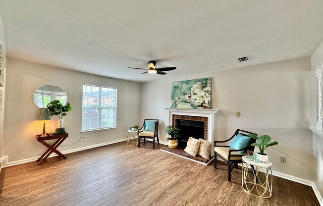 Completely Updated & Ready NOW! New Flooring, Fresh Paint, New Fixtures! HUGE Fenced Backyard!