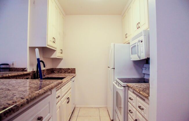 Spacious Top Floor 2-Bedroom Condo in Cross Creek Village with Resort-Style Amenities