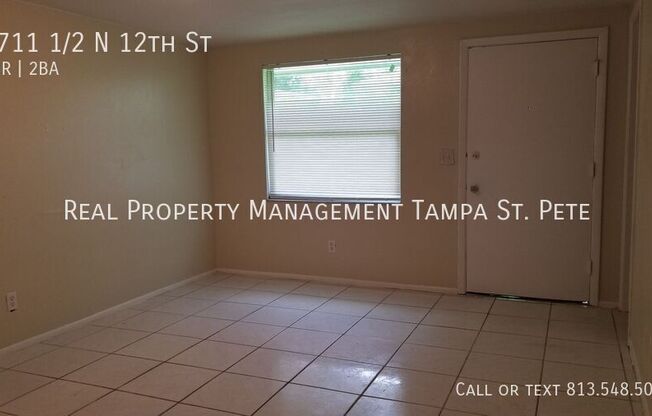 8711 1/2 N 12 ST