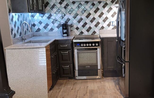 Single story centrally located with mother-in-law apartment included.