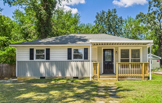 Updated home with New Kitchen, Hardwood Floors, Fenced!
