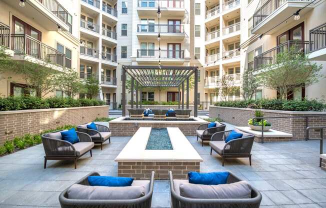 Outdoor sitting area surrounding a water fixture