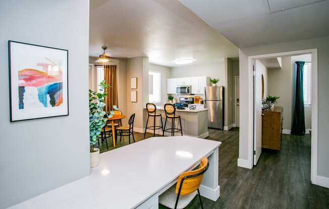 Octave Apartments a kitchen and living room with a white counter top at Octave Apartments, Las Vegas, NV, 89123