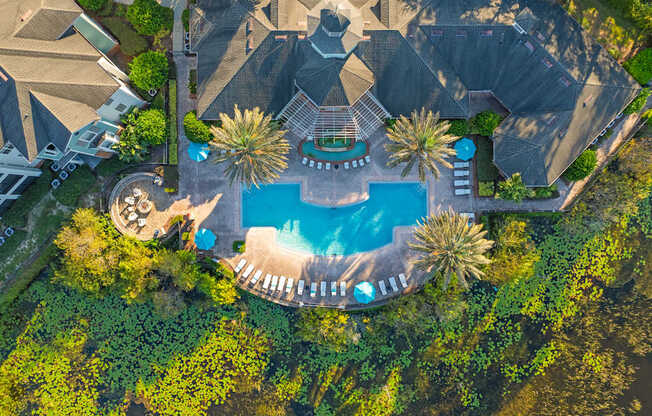 a birds eye view of the pool at the resort at longboat key club