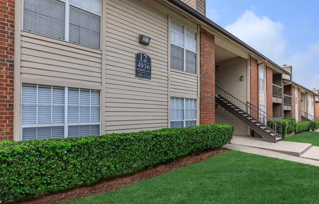 Oak Chase community building with green grass