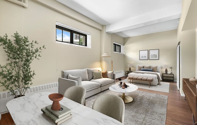 a living room with a couch and a table