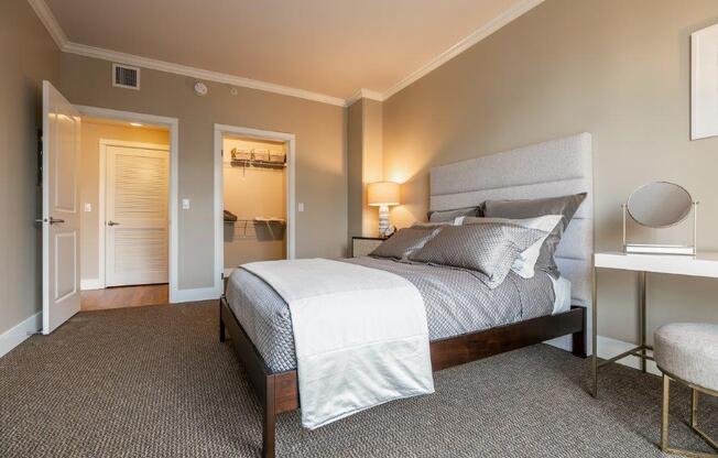 The Mercer bedroom with bed, closet, and desk