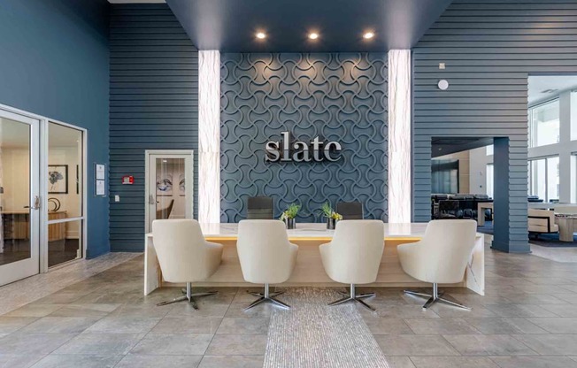 slate scottsdale leasing office with large table and chairs