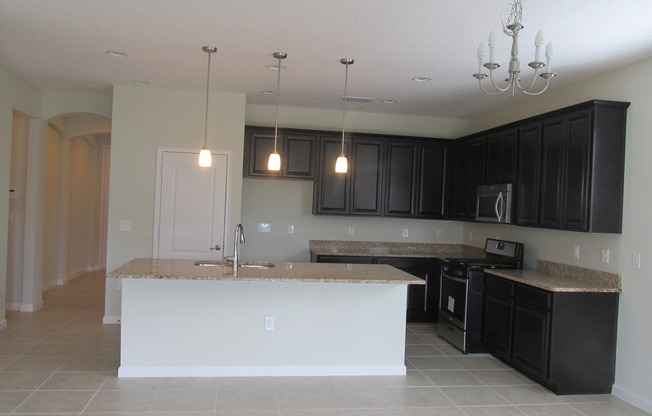 3 Bedroom, 2 Bath,Plus office room ,2 Car Garage, Single Family Home at2404 Sabastian St, Mount Dora FL 32757 For Rent.