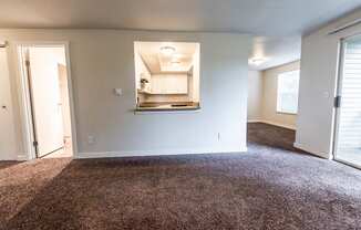 Tacoma Apartments - Sienna Apartments - Living Room, Kitchen, Dining Room, and Deck