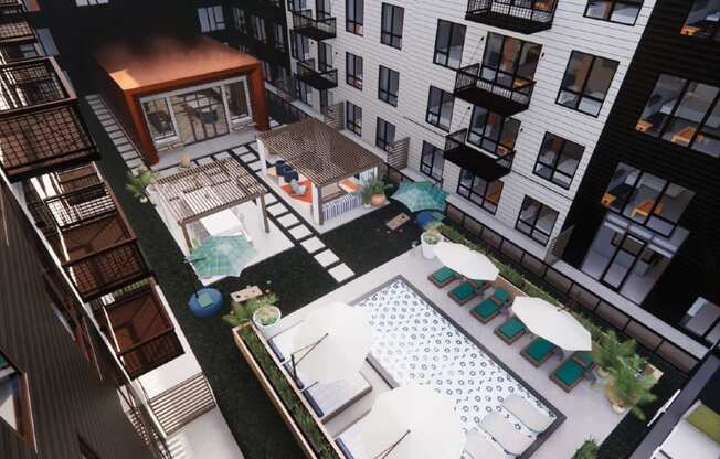 an aerial view of the courtyard of an apartment building