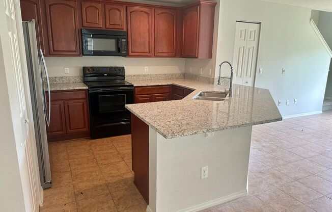 Beautiful Gated 3/2.5 Townhouse with lots of goodies