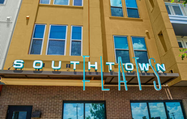 the sign for south town on the side of a building