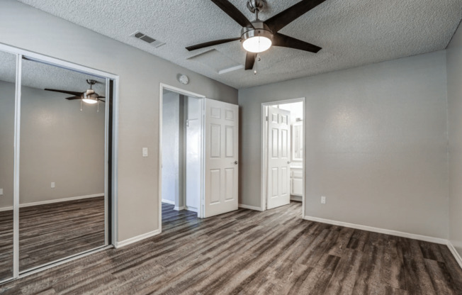 an empty living room with wood flooring and a window at Aspire Upland Apartments, Upland, 91786