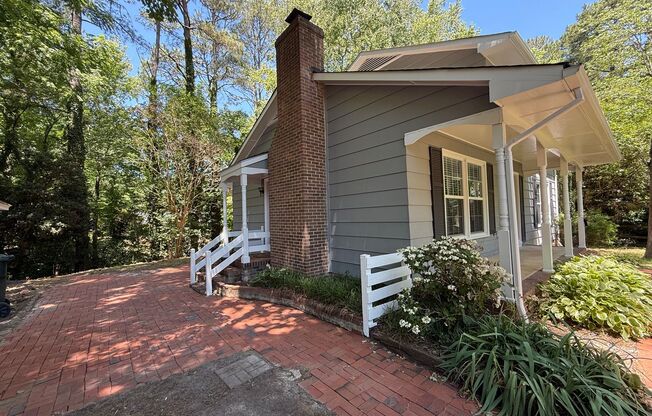 **OFFERING REFUNDABLE APPLICATION FEES & $150 MOVE IN PROMOTION** Terrific 3BD, 1.5BA North Raleigh House with Modern Updates and Private Backyard
